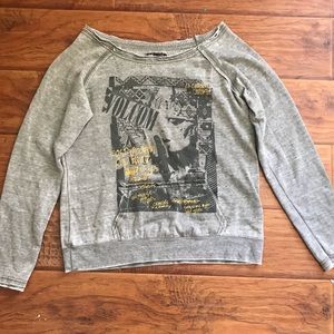 Edgy and Distressed Off The Shoulder Crew Neck